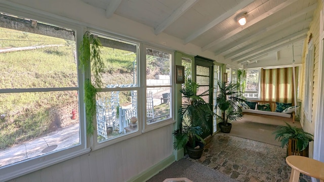 sunroom / solarium with wooden ceiling and vaulted ceiling