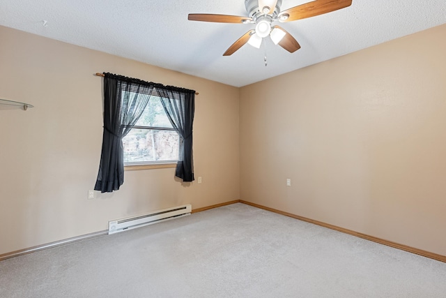 spare room featuring a textured ceiling, a ceiling fan, baseboard heating, and light carpet