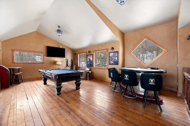 rec room featuring vaulted ceiling, pool table, wood-type flooring, and baseboards