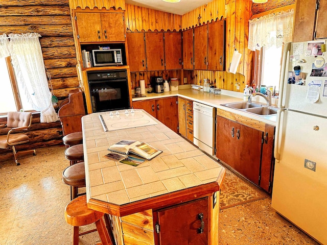 kitchen featuring stainless steel appliances and sink