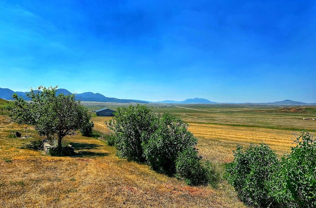 property view of mountains featuring a rural view