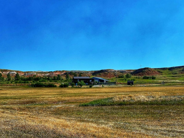 view of mountain feature featuring a rural view