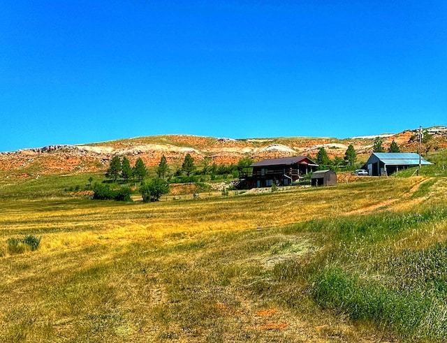 view of mountain feature featuring a rural view