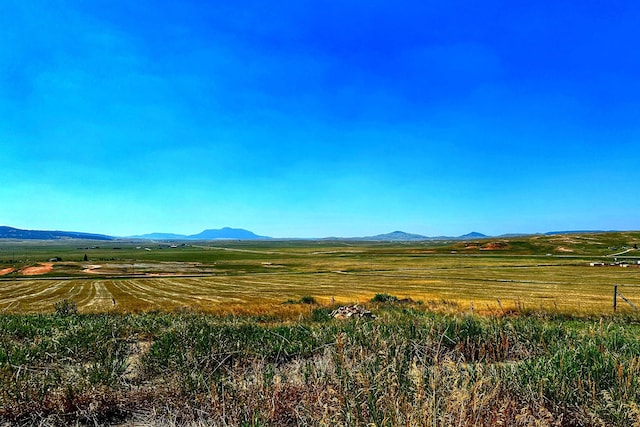 view of mountain feature with a rural view