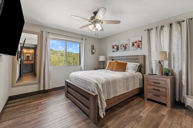 bedroom featuring dark wood-type flooring and ceiling fan