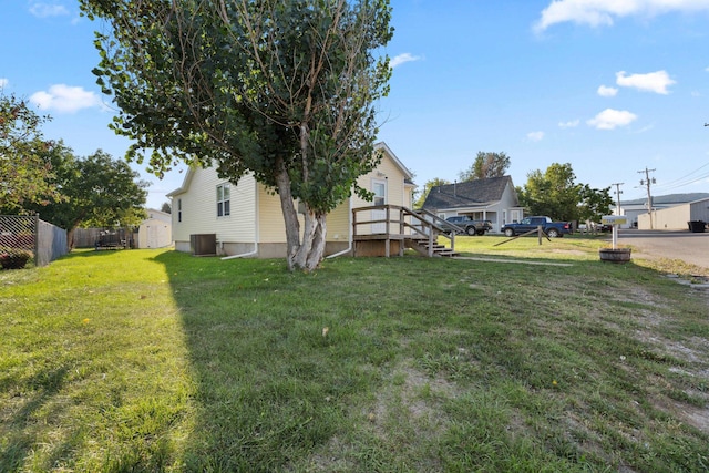 view of yard with central AC