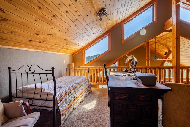 bedroom featuring carpet, lofted ceiling with skylight, and wood ceiling