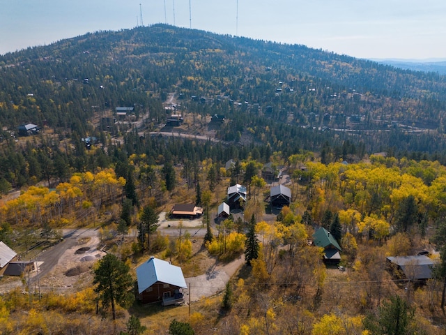 bird's eye view featuring a forest view