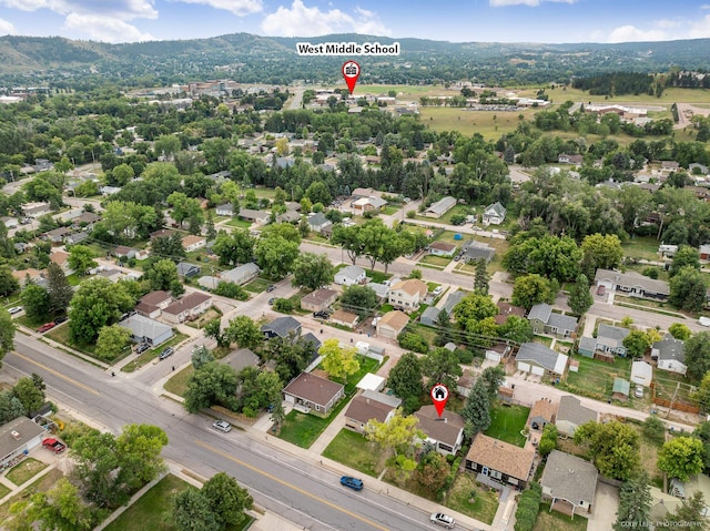 birds eye view of property featuring a mountain view