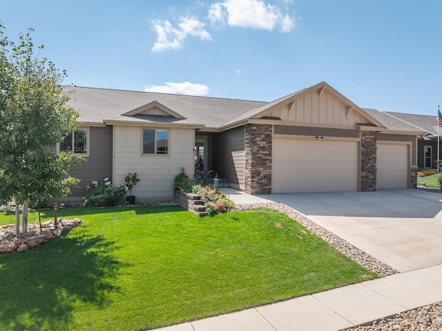 ranch-style house featuring a garage and a front lawn