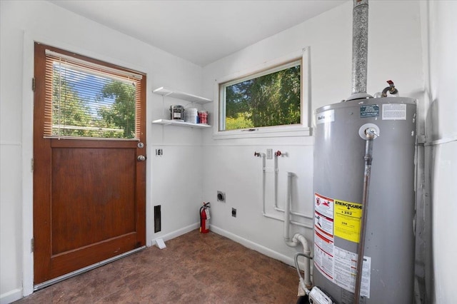 utility room featuring water heater