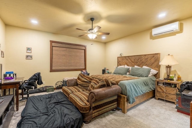 carpeted bedroom featuring ceiling fan and an AC wall unit