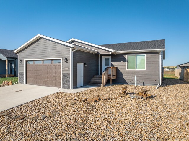 single story home featuring a garage