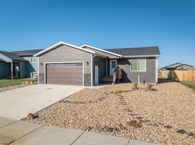 ranch-style home with a garage