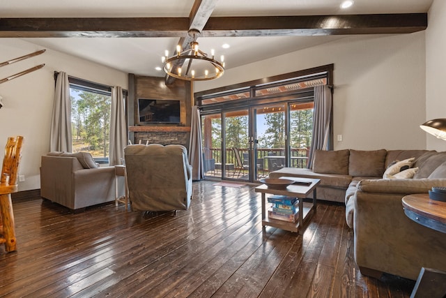 living room featuring a fireplace, beamed ceiling, french doors, dark hardwood / wood-style floors, and a chandelier