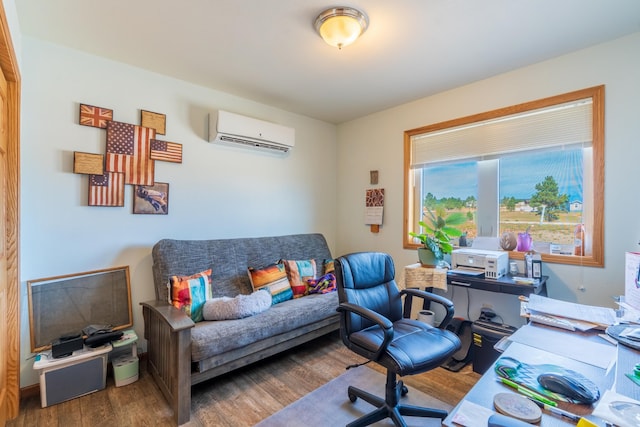 office area with hardwood / wood-style floors and a wall mounted AC