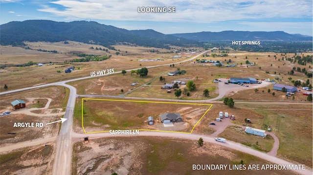 bird's eye view with a mountain view and a rural view