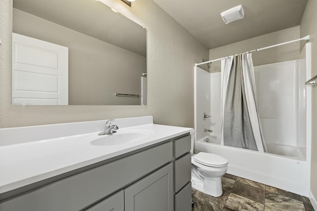 full bathroom with shower / bath combo with shower curtain, vanity, and toilet