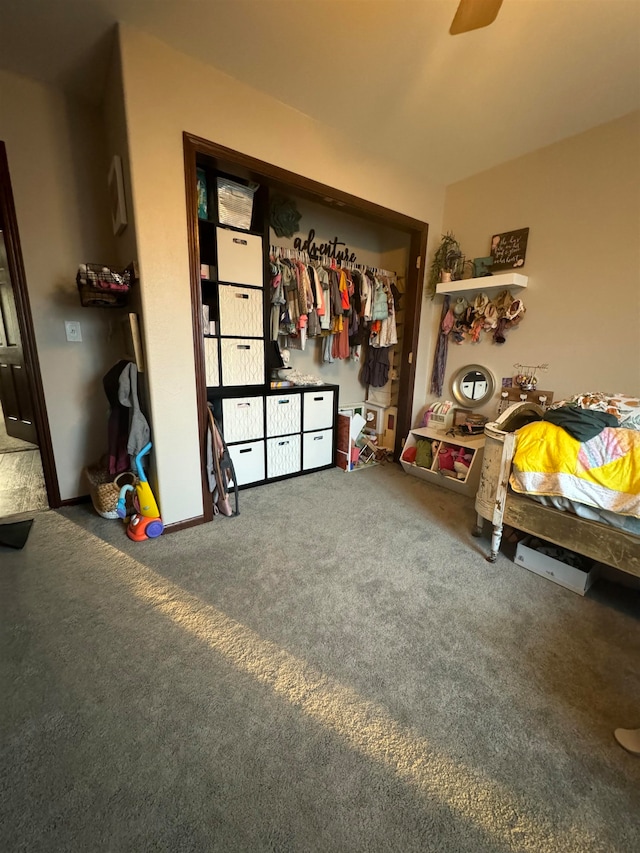 carpeted bedroom featuring a closet