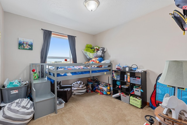 bedroom with light colored carpet