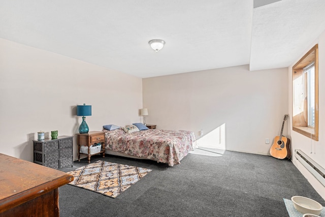 carpeted bedroom with baseboard heating