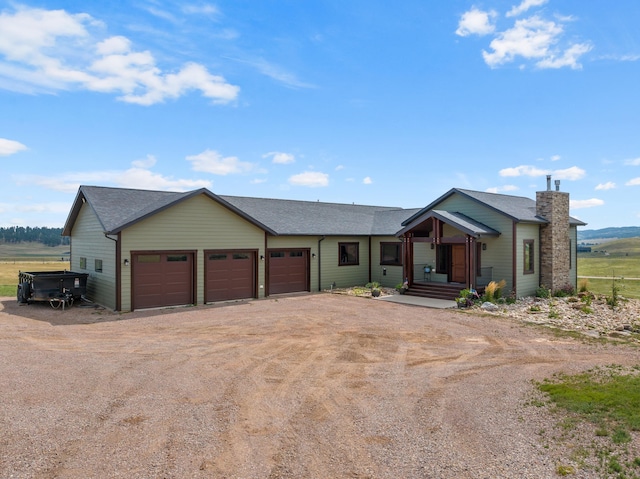 ranch-style home with a garage