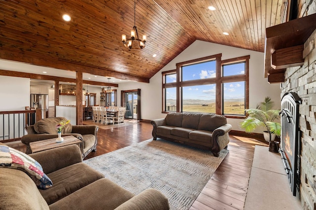 living room featuring a stone fireplace, high vaulted ceiling, wooden ceiling, an inviting chandelier, and hardwood / wood-style floors