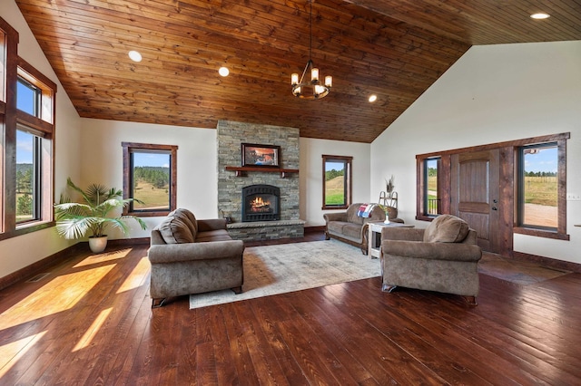 living room with an inviting chandelier, dark wood-type flooring, high vaulted ceiling, and a healthy amount of sunlight