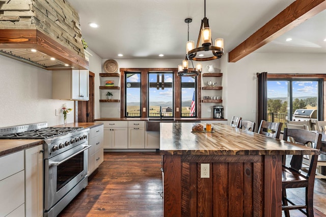 kitchen featuring a kitchen island, dark hardwood / wood-style floors, butcher block counters, high end stainless steel range, and custom exhaust hood