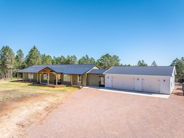 ranch-style home featuring a garage