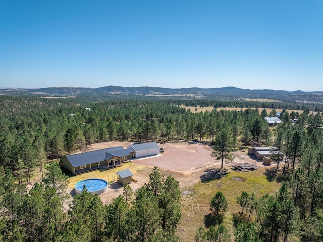 drone / aerial view featuring a mountain view