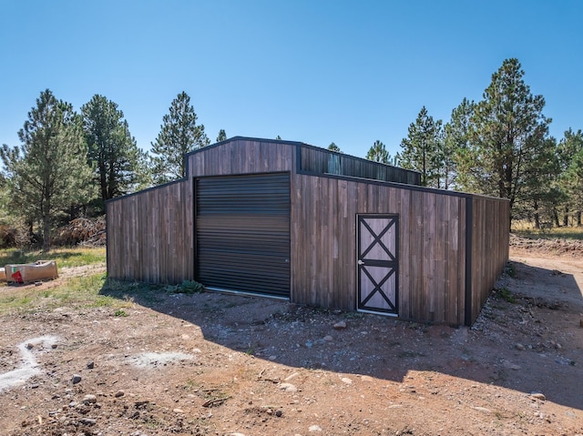 view of outdoor structure with a garage