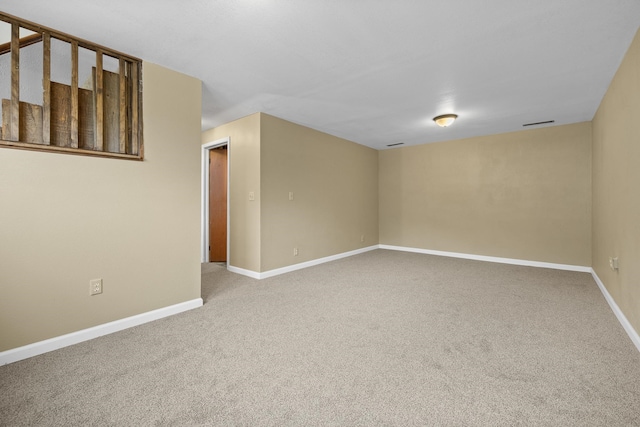 unfurnished room with carpet flooring