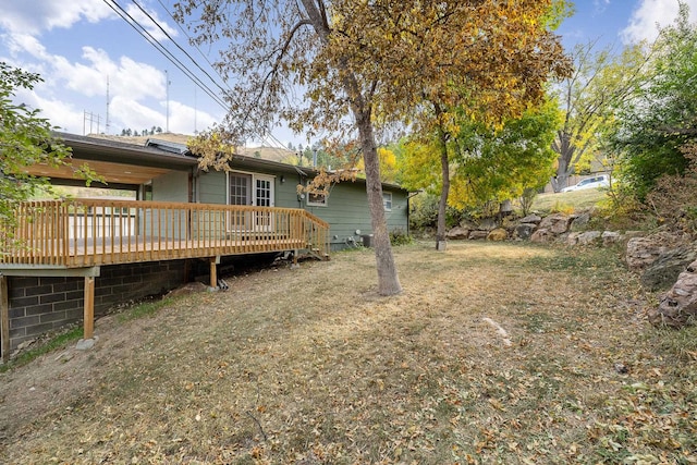 view of yard featuring a deck