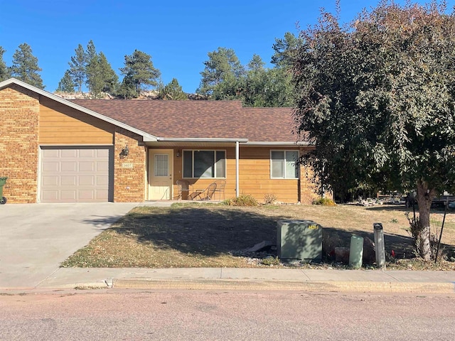 single story home with a garage