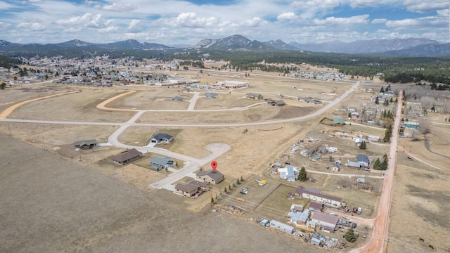 bird's eye view with a mountain view