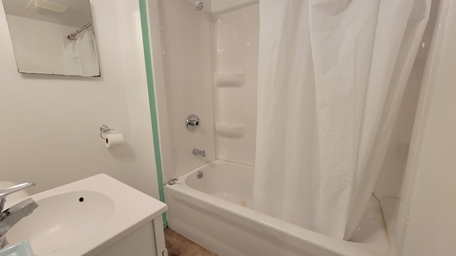 bathroom with vanity and shower / bath combination with curtain