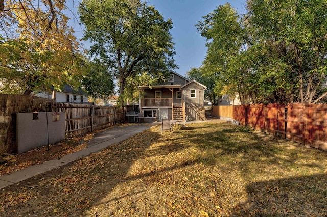 view of yard featuring a deck