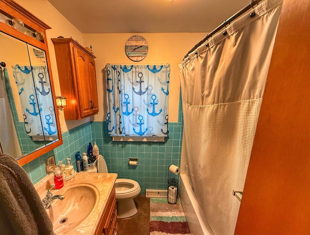 full bathroom with vanity, toilet, shower / bathtub combination with curtain, and tile walls