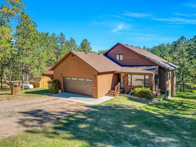 view of front of house with a front lawn and a garage