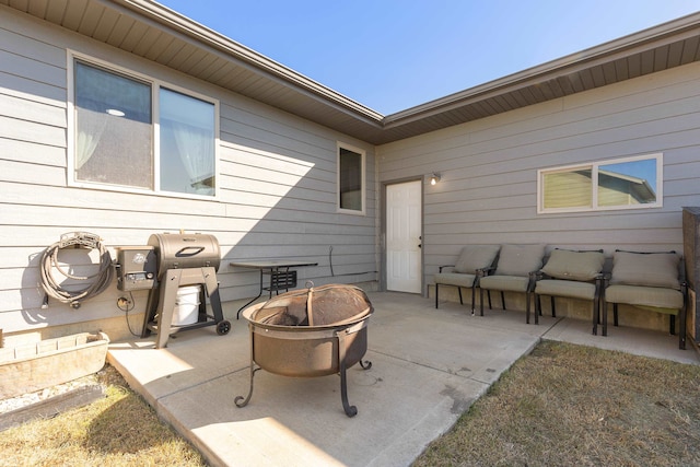 view of patio / terrace featuring a fire pit