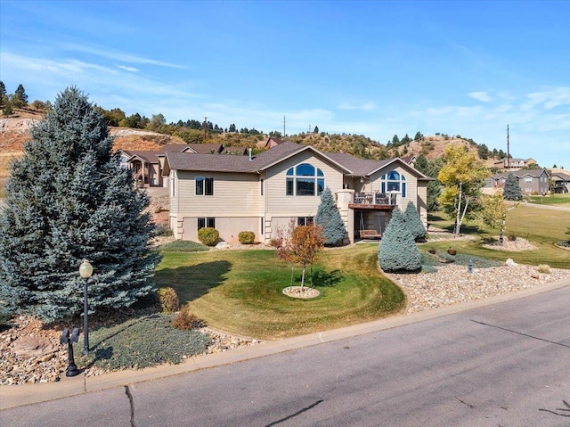 view of front of property with a front lawn