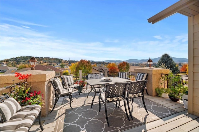 wooden terrace featuring a mountain view