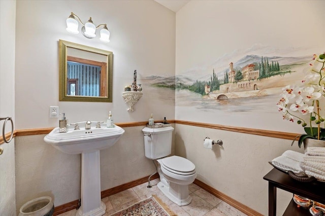 bathroom featuring toilet