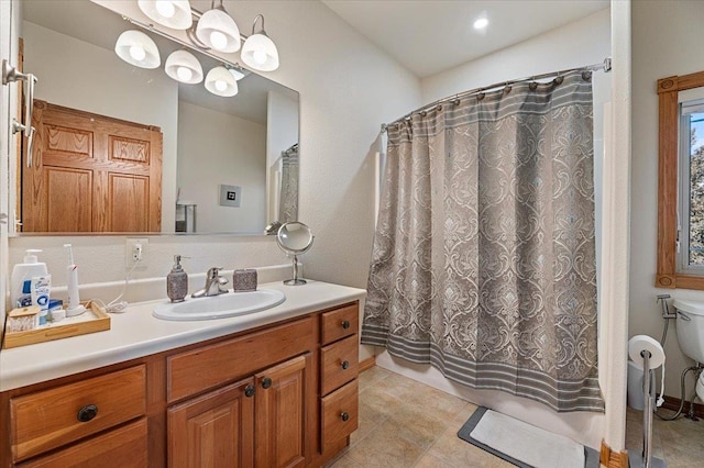 bathroom with vanity, toilet, tile patterned floors, and a shower with shower curtain