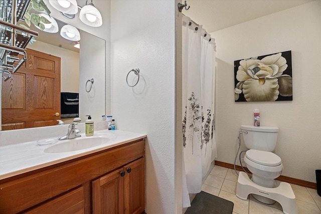 bathroom with toilet, vanity, tile patterned floors, and a shower with shower curtain