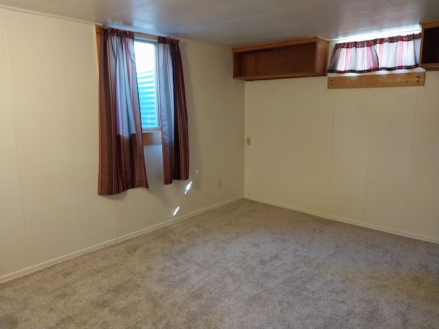 spare room with light colored carpet