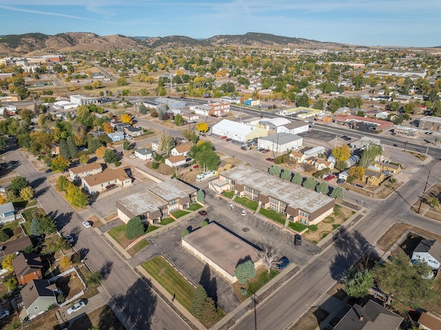 birds eye view of property featuring a mountain view