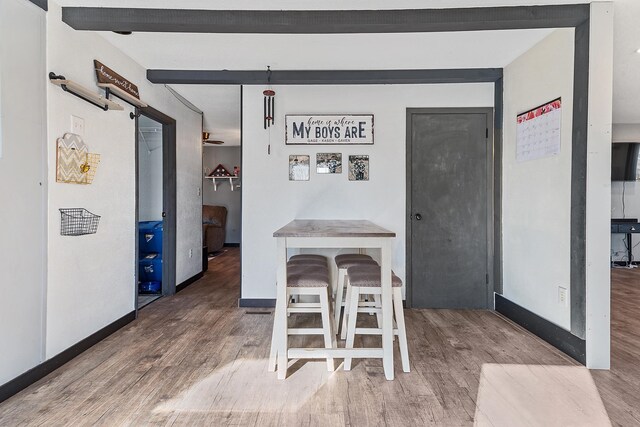 dining space featuring hardwood / wood-style flooring