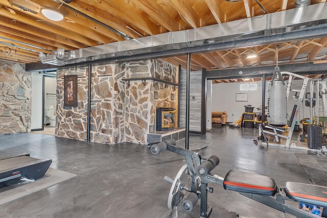 exercise room featuring concrete flooring